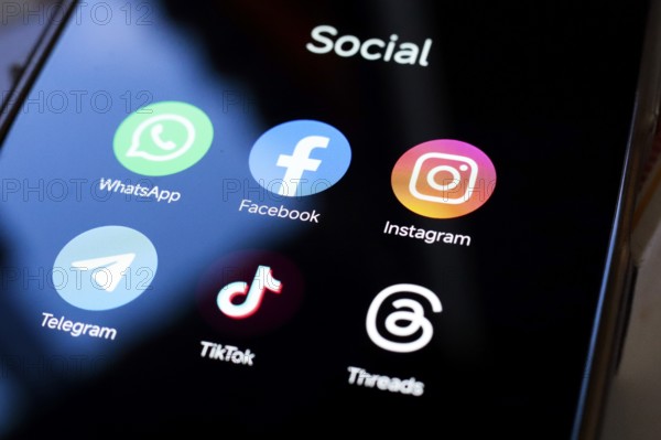 In this photo illustration, WhatsApp, Facebook, Instagram, Telegram, TikTok and Threads apps