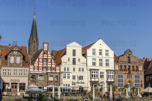Historic surrounding gabled houses with many shops and restaurants on the square Am Sande in the