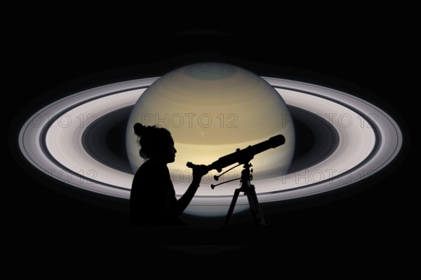 Girl looking at the stars with telescope. Saturn planet, isolated on black. Elements of this image
