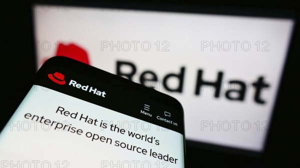 Stuttgart, Germany, 01-06-2022: Mobile phone with webpage of American software company Red Hat Inc.