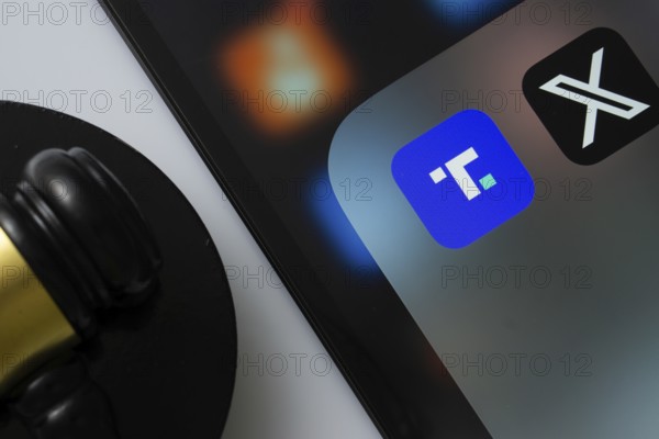 A close up of an iPad screen displaying the Truth Social and Twitter (X) app alongside a judge's