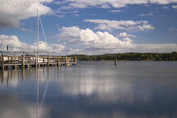 View over the Scharmützelsee with jetty and marina, long exposure, Wendisch-Rietz, Brandenburg,