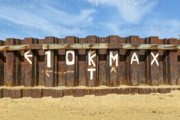 Speed limit of ten knots, steel sheet piling sea wall coastal defence, River Deben, Bawdsey,