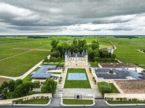 Chateau Pichon Longueville Baron Vineyard and grape fields around Pauillac from a drone, Bordeaux,