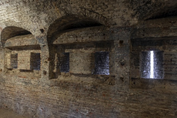 Rifle ports inside caponier at Fort Napoleon, polygonal fort of the Napoleonic era in the dunes at