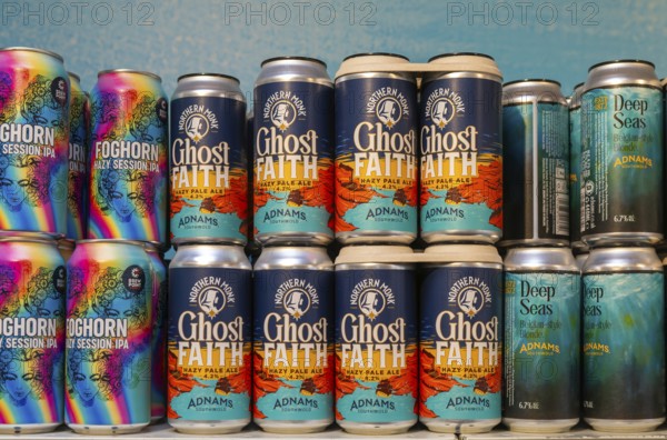 Adnams beer products on display inside brewery shop, Southwold, Suffolk, England, UK - Ghost Faith