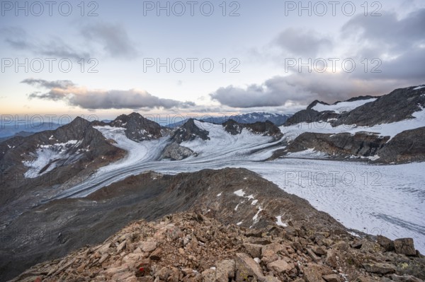 Sunset at the summit of the Becher, picturesque high mountain landscape, view of mountain peaks