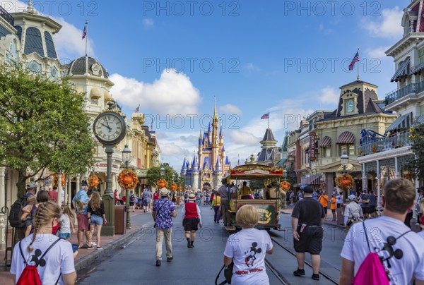 Horse pulling trolley car with Disney characters down Main Street in the Magic Kingdom at Walt