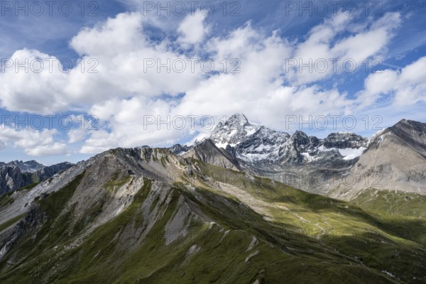 View of picturesque mountain landscape with snow-covered summit of the Großglockner, Wiener