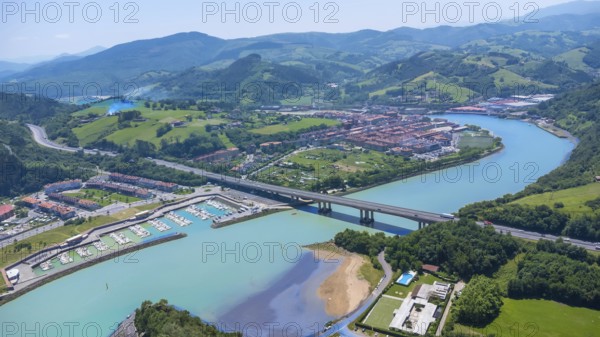 Aerial view of orio, a charming town in gipuzkoa, basque country, spain, showcasing the river,