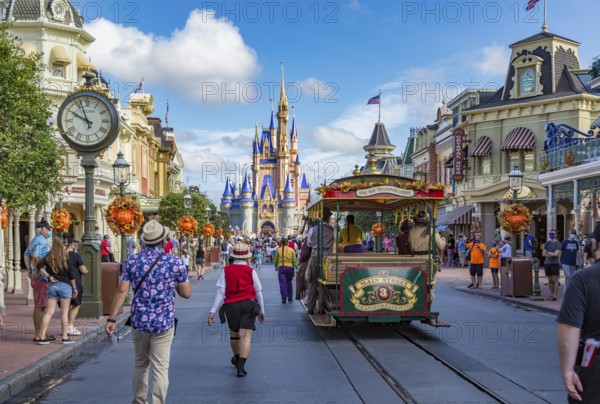 Horse pulling trolley car with Disney characters down Main Street in the Magic Kingdom at Walt