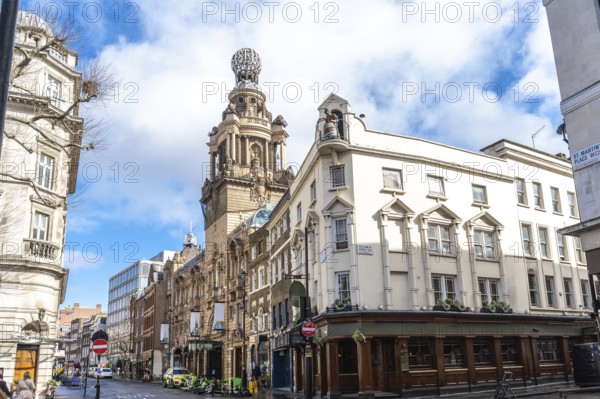 City street view featuring the london coliseum, a historic theatre located in st. Martin's lane,