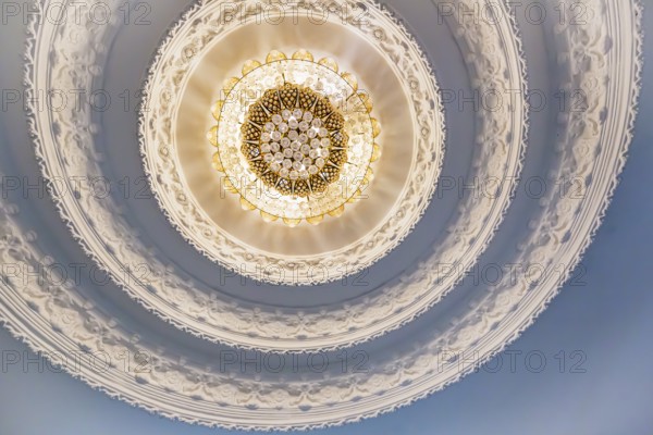 Ornate recessed light fixtures in the ceiling inside the Guan Yin (Goddess of Mercy) statue at Wat