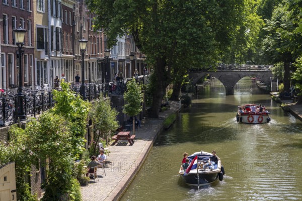 The old town centre of Utrecht, Oudegracht, around 2 km long with many old houses, shops,