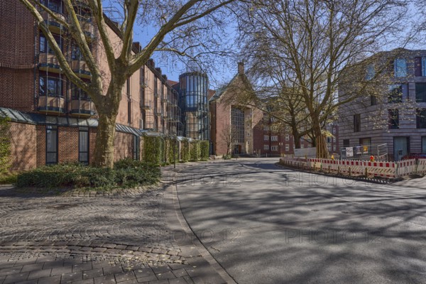 Street, general architecture, pavement, paving slabs, bare wintry trees, fenced-off construction