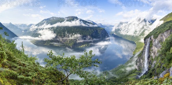 Panoramic view, Gjerdefossen waterfall, at Ørnesvingen viewpoint, atmospheric clouds over the fjord