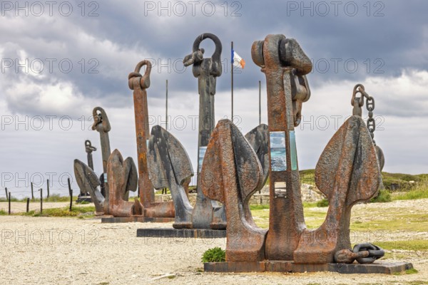 Old rusty anchor from warships by the Atlantic Battle Memorial Museum at Pointe de Pen Hir,