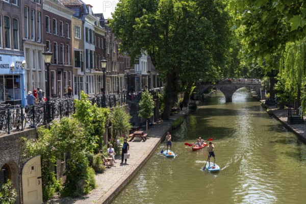 The old town centre of Utrecht, Oudegracht, around 2 km long with many old houses, shops,