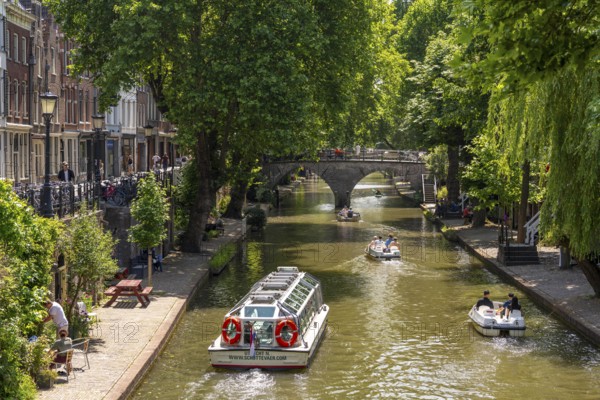 The old town centre of Utrecht, Oudegracht, around 2 km long with many old houses, shops,