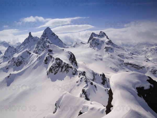 gorgeous mountain landscape in deep winter with impressive peaks in the Alps near Klosters in the