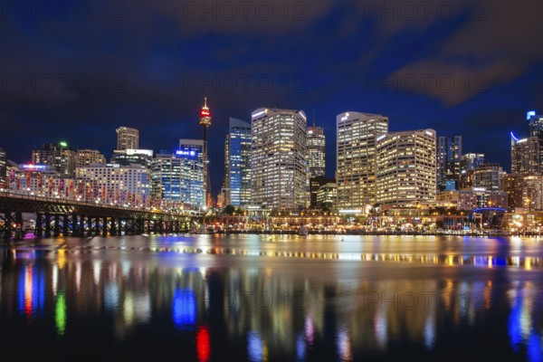 Sydney, Australia, October 14 2013: Sydney skyline and Pyrmont bridge at dusk near Darling Harbour,
