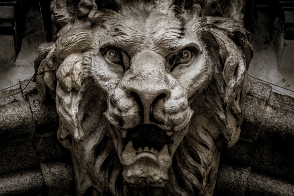 Italy, Turin. Made of stone and located on a marble arch, aroud 300 years old. Fallen angel in the