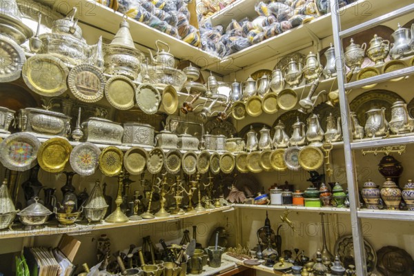 Marketplace in historic medina, full of souvenirs, leather bags, metal pieces, Tetouan, Morocco,