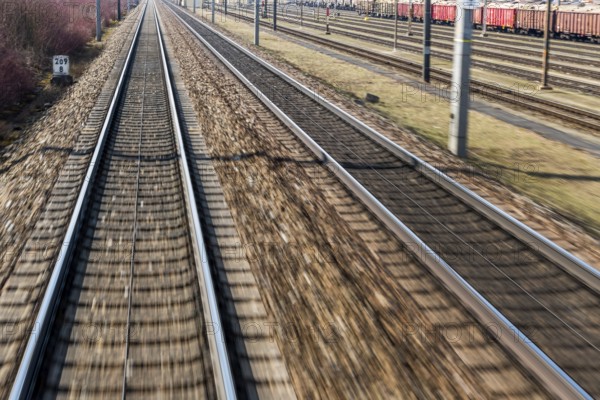Austria, Upper Austria, Linz, Wels . Railway tracks seen from a moving train between Linz and Wels