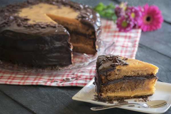 Tasty piece of cake with a Brigadeiro filling made with condensed milk and chocolate, with the