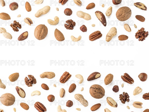 Pattern of nuts mix with copy space. Various nuts isolated on white. Pecan, macadamia, brazil nut,
