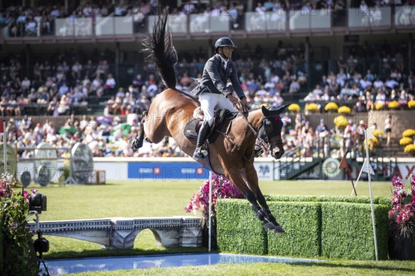 Mariano Martinez Bastida of Spain and riding Jup compete in the first round of the 1.60m CPKC
