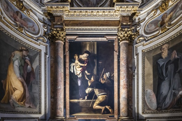 Altarpiece with the Madonna di Loreto by the Italian Baroque master Caravaggio in the Cavalletti