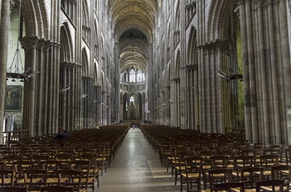 Rouen, France, August 30, 2018: Interior of a catholic temple. Central nave of the Notre-Dame de