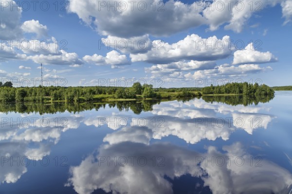 Landscape with a symmetrical reflection on the Vyg river (part of the White Sea-Baltic Canal),