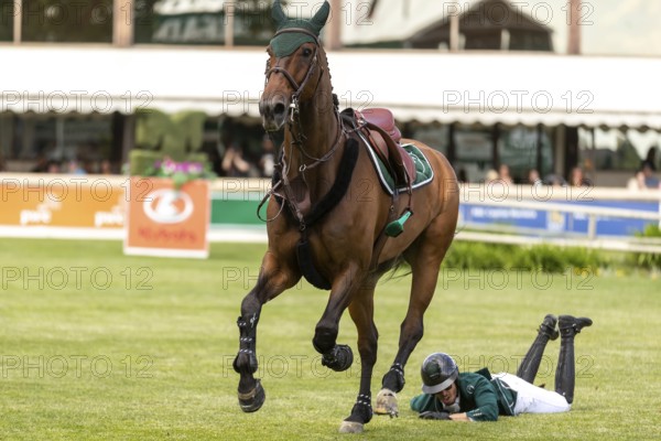 Abdulrahman Alrajhi of Saudi Arabia loses his mount, Ventago, during the 1.60m RBC Grand Prix of