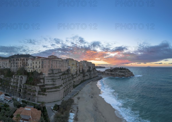 Tropea, Italy, 16 December, 2023: panorama view of Rotonda Beach and the colourful old town of