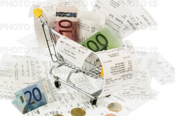 Shopping trolley, banknotes and receipts, symbolic photo for purchasing power, consumption and