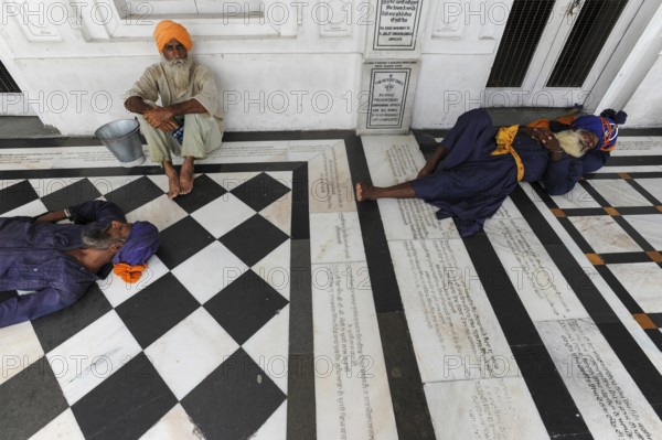22.07.2011, Amritsar, Punjab, India, Sikh worshippers at the Golden Temple, the highest sanctuary