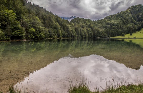 Alatsee, natural lake west of Füssen in the district of Ostallgäu. The lake is up to 35m deep and