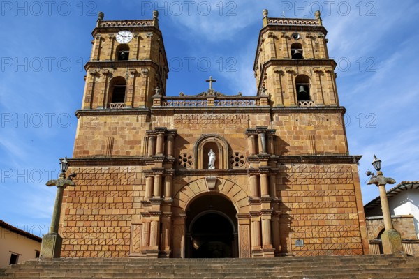 Front view of impressive colonial Cathedral of the Immaculate Conception against blue sky and veil