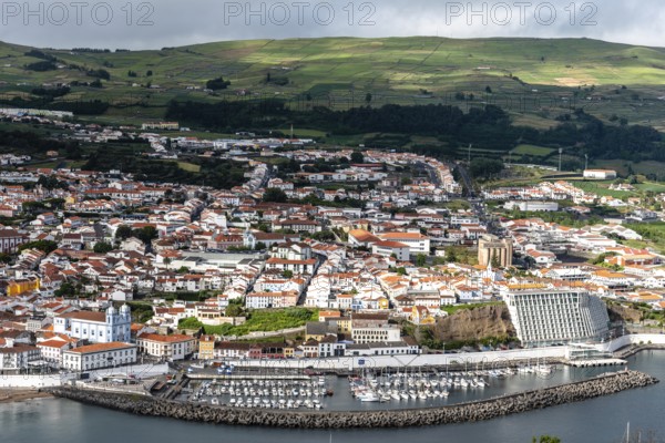 Angra do Heroismo, Portugal, July 1, 2022: Panoramic Aerial View of the old Town and the port of