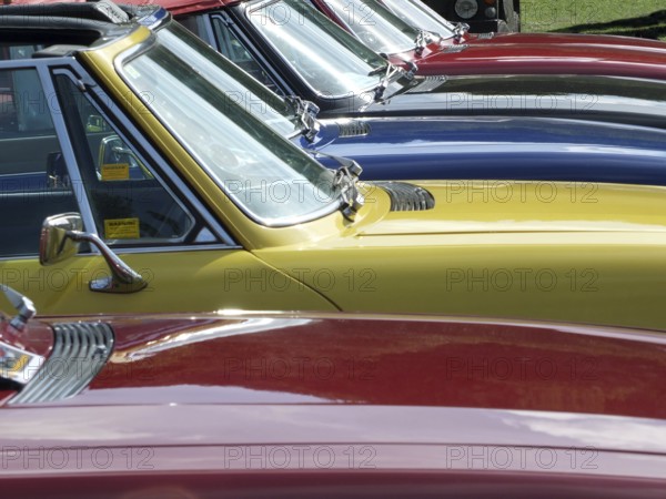Hebden Bridge, West Yorkshire, England, August 4 2018: Close up of the bonnets and windscreens of a