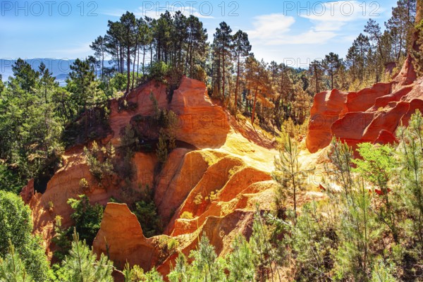 France, Provence. The village of Roussillon is surrounded by picturesque ocher cliffs. Now the