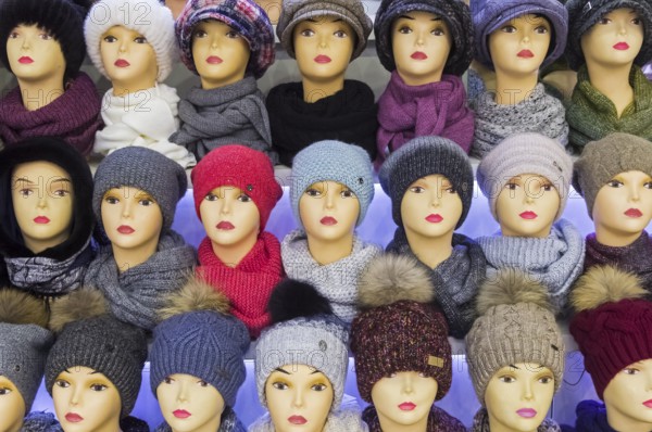 Moscow, Russia, Decembet 15, 2019: Mannequin heads in knitted hats and scarves, Europe