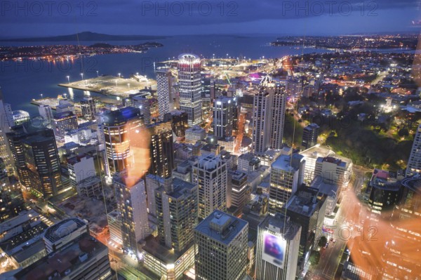 Amazing aerial view of Auckland skyline at night. City buildings and skyscrapers, New Zealand,