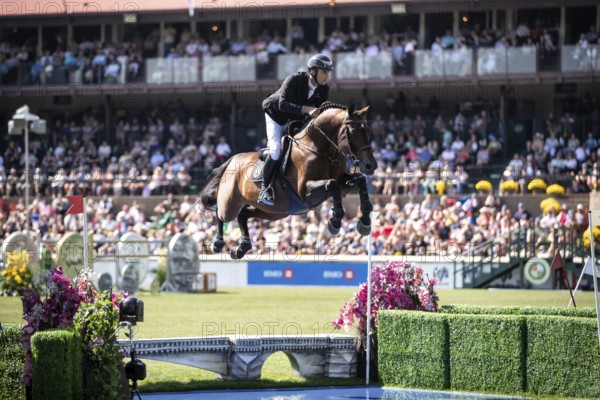 Richard Vogel of Germany and riding United Touch S compete in the first round of the 1.60m CPKC