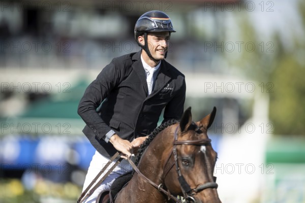 German rider Richard Vogel riding United Touch S competes in the second round and jumpoff of the