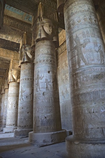 Interior of the painted and carved hypostyle hall at Dendera Temple. Ancient Egyptian temple near