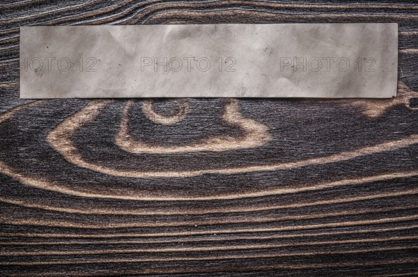 Price tag on vintage wooden board copy space