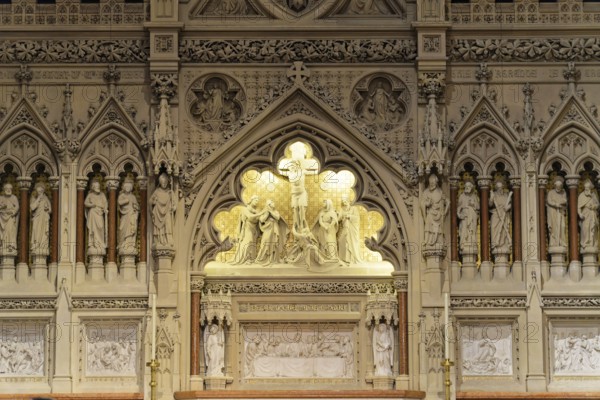 Interior view of the majestic Trinity Church, Detailed reliefs and sculptures on a church wall,